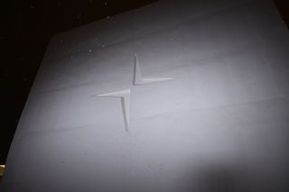 Polestar logo carved in snow at Polestar Snow Space, Finland