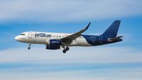 A JetBlue aircraft in the air