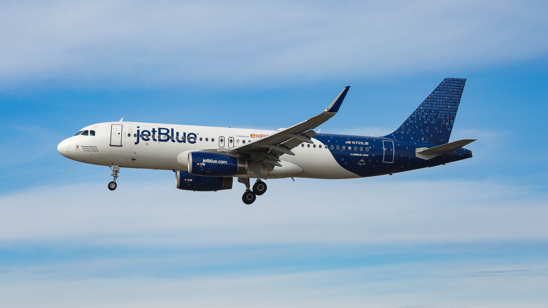 A JetBlue aircraft in the air