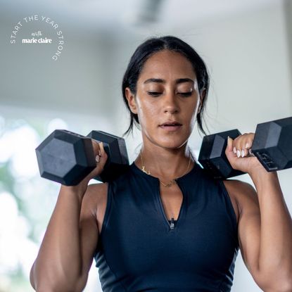 Home workouts with dumbbells: A woman working out at home