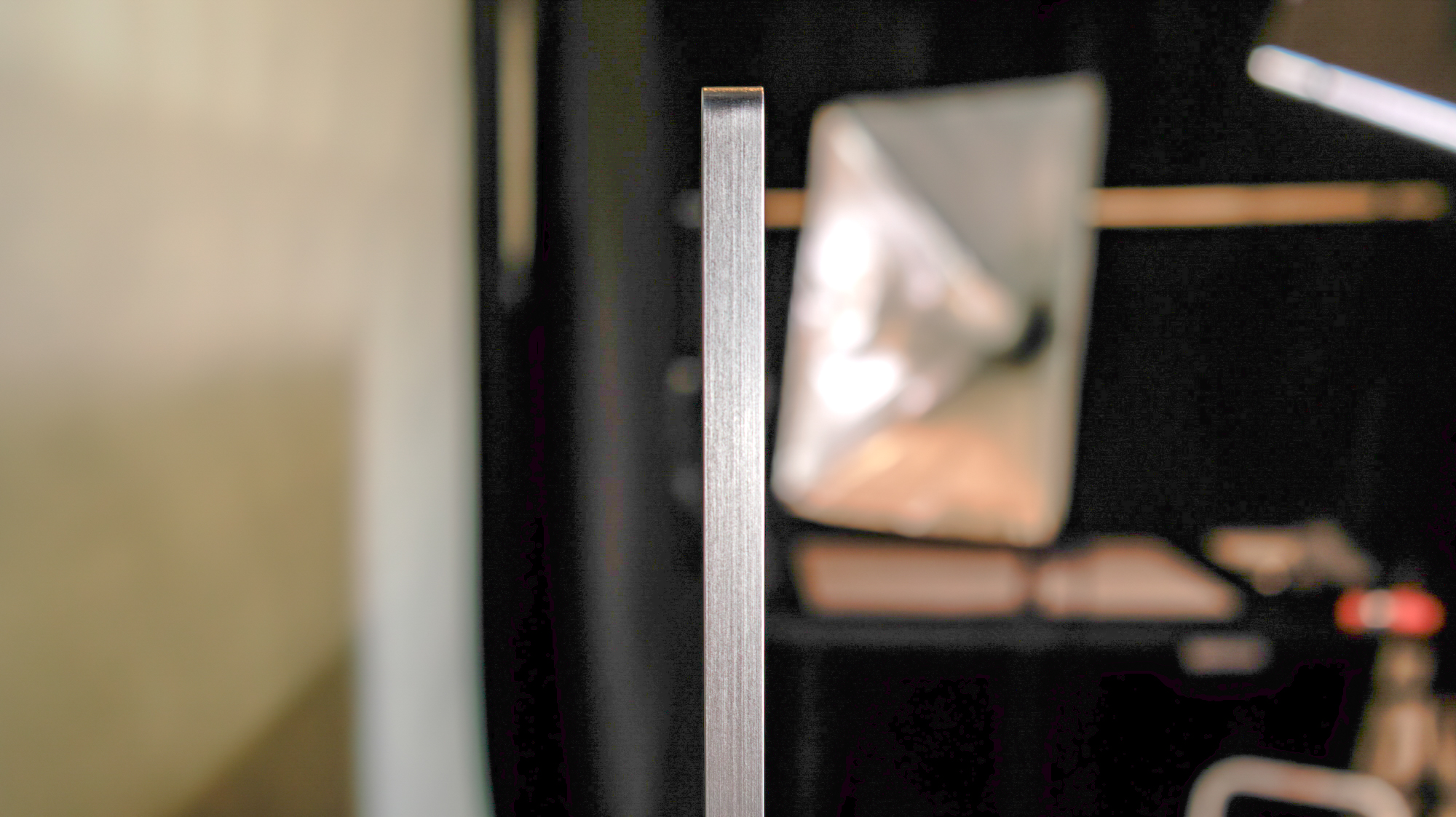 LG C6 OLED TV shown on a wood table