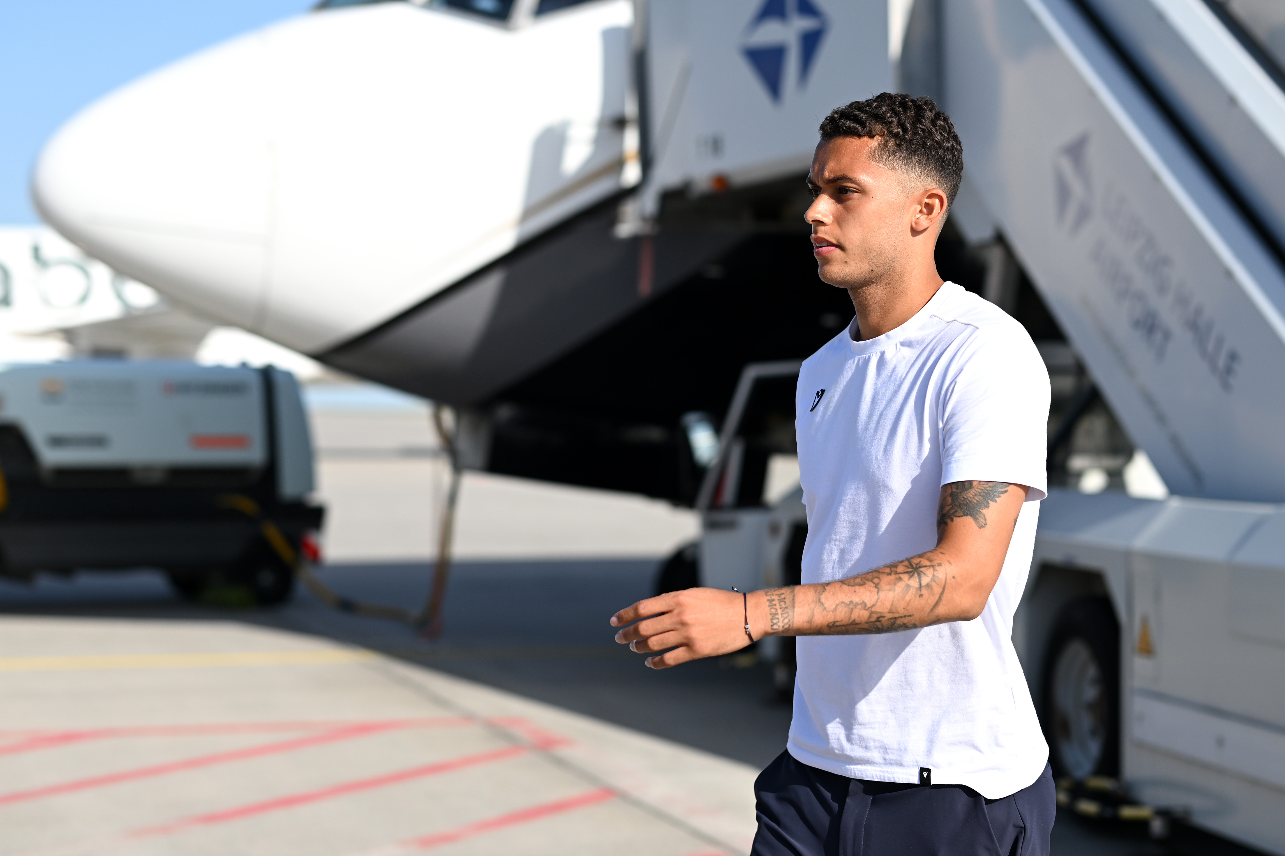 LEIPZIG, GERMANY - MAY 26: Brennan Johnson of Crystal Palace disembarks as the plane carrying the Crystal Palace team arrives at Leipzig Halle Airport ahead of their UEFA Conference League Final 2026 match against Rayo Vallecano on May 26, 2026 in Leipzig, Germany. (Photo by Christian Kaspar-Bartke - UEFA/UEFA via Getty Images)