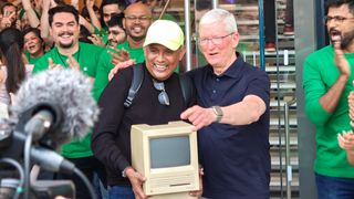 Apple BKC launch Tim Cook with fan and Macintosh SE