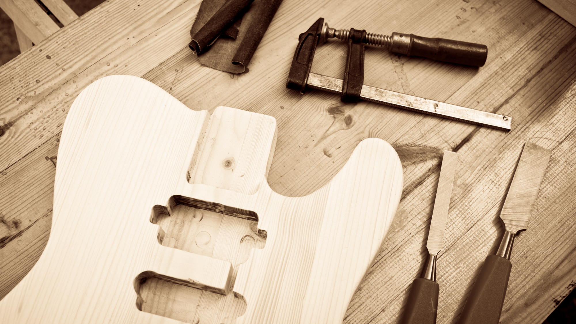 Tele-style DIY guitar kit on a workbench