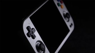 Angled view of the Anbernic RG477M in gunmetal