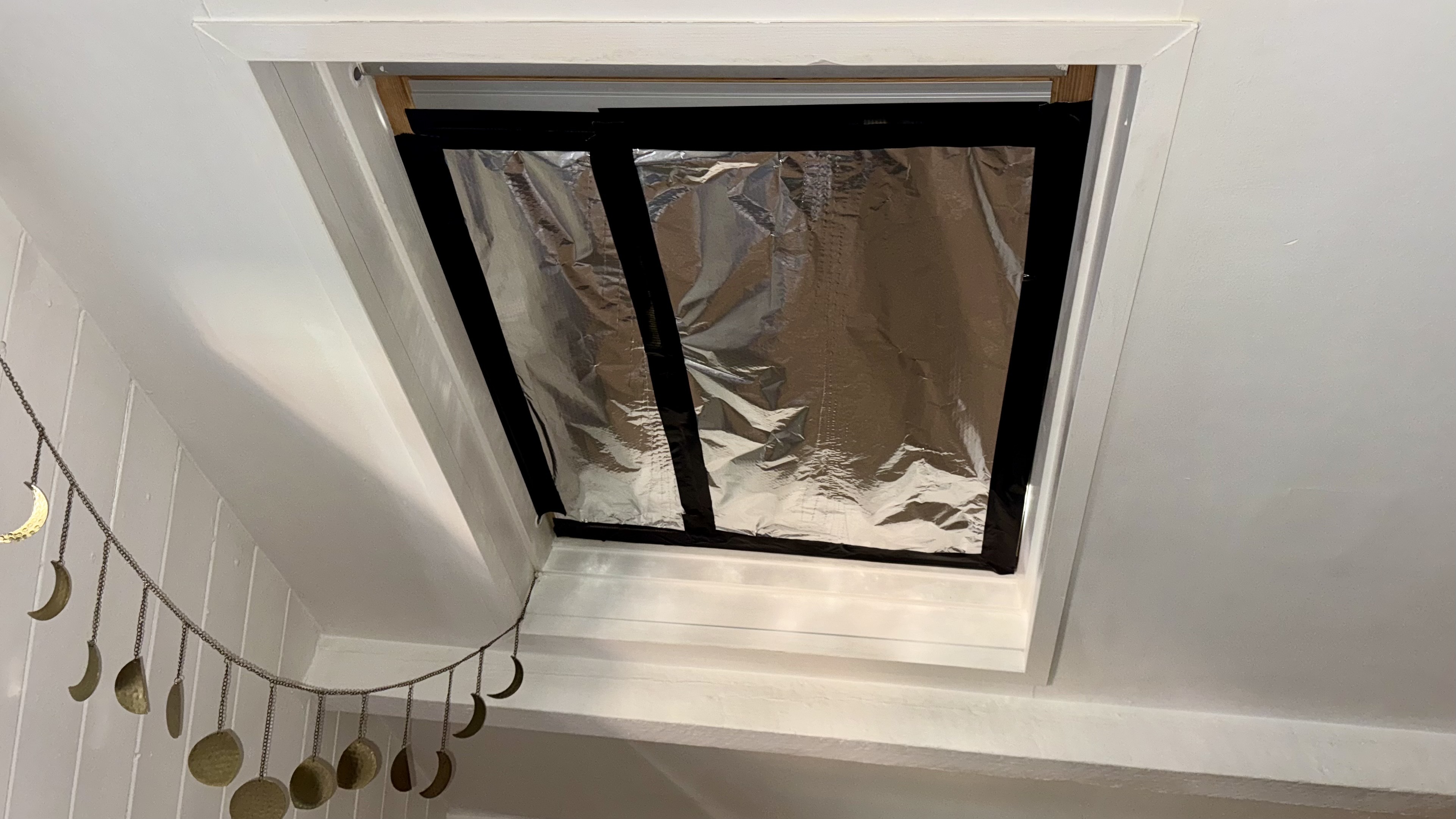 Foil cooling hack on attic bedroom window