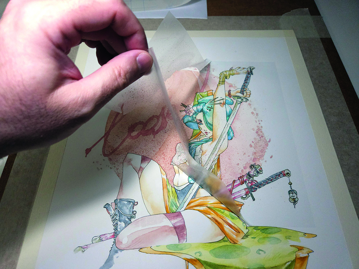 Watercolour geisha; peeling a film mask off a painting