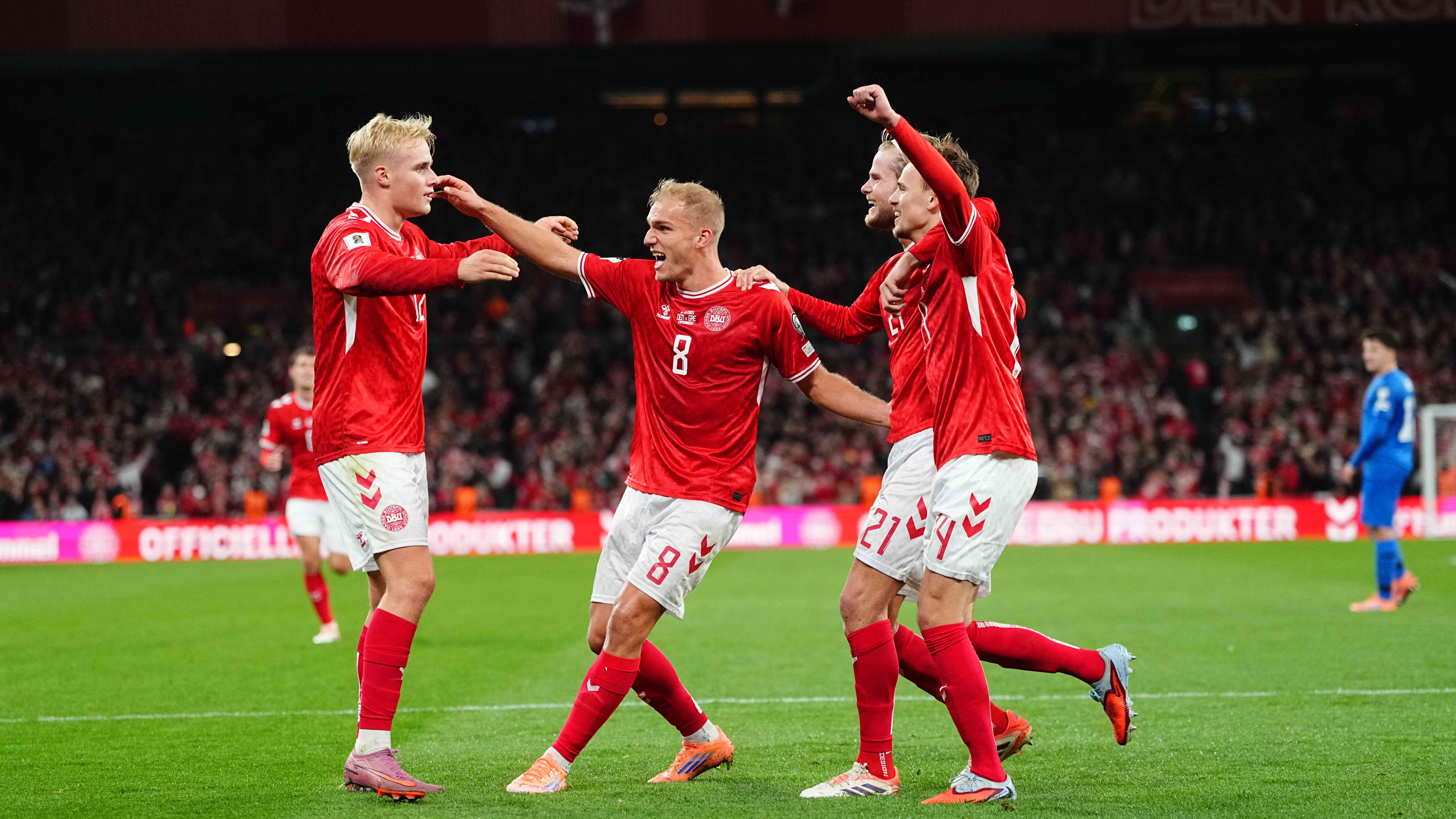 Mikkel Damsgaard of Denmark scores and celebrates his teams third goal during the UEFA World Cup qualification match between Denmark and Greece at Parken Stadium, Copenhagen, Denmark on October 12, 2025.