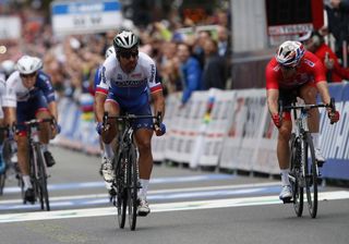 Peter Sagan (Slovakia) out-sprints Alexander Kristoff (Norway) to win his third straight world title
