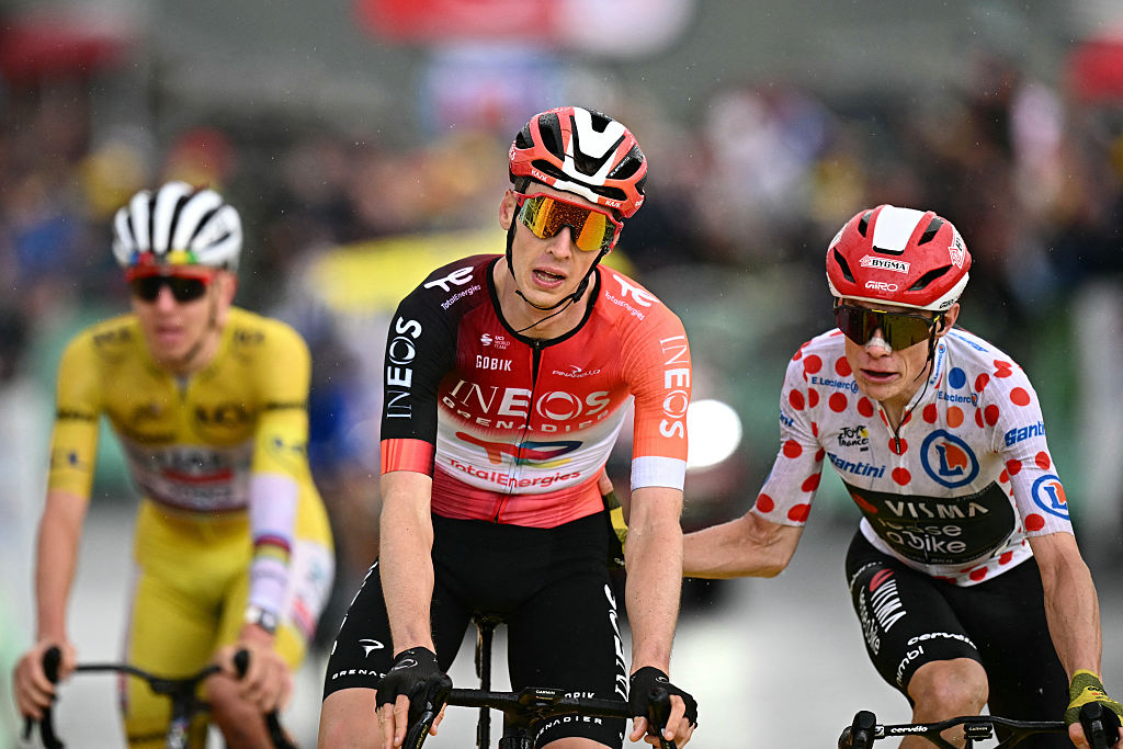 INEOS Grenadiers team's Dutch rider Thymen Arensman (C) cycles to the finish line to win ahead of Team Visma - Lease a bike team's Danish rider Jonas Vingegaard (R) placing second and UAE Team Emirates - XRG team's Slovenian rider Tadej Pogacar (L) placing third in the 19th stage of the 112th edition of the Tour de France cycling race, 93.1 km between Albertville and La Plagne, in the French Alps, on July 25, 2025. The 19th stage of the Tour de France was shorted from its initial 129.9 km route, bypassing the Col des Saisies where an outbreak of nodular dermatitis in a herd of cattle was discovered, prompting organizers to modify the race route. (Photo by Loic VENANCE / AFP) (Photo by LOIC VENANCE/AFP via Getty Images)