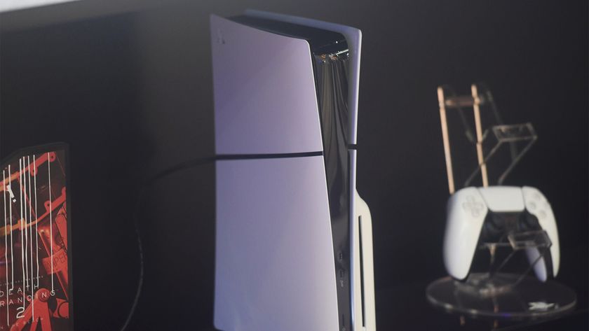 the PlayStation 5 with its controller in the background