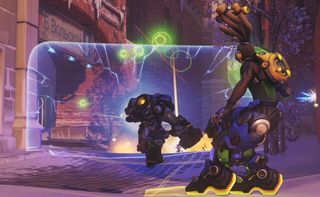 Lucio behind Reinhardt and his shield