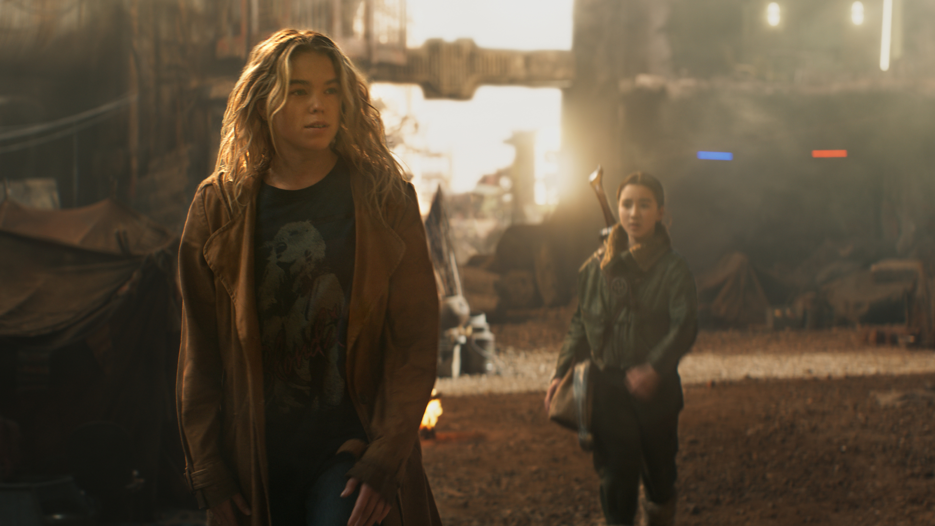 Milly Alcock as Supergirl and Eve Ridley as Ruthye in Supergirl