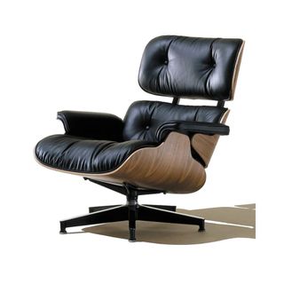 eames lounge chair in black leather and walnut