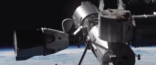 This still from a SpaceX animation of the upcoming Demo-2 mission shows the Crew Dragon capsule about to dock with the International Space Station.
