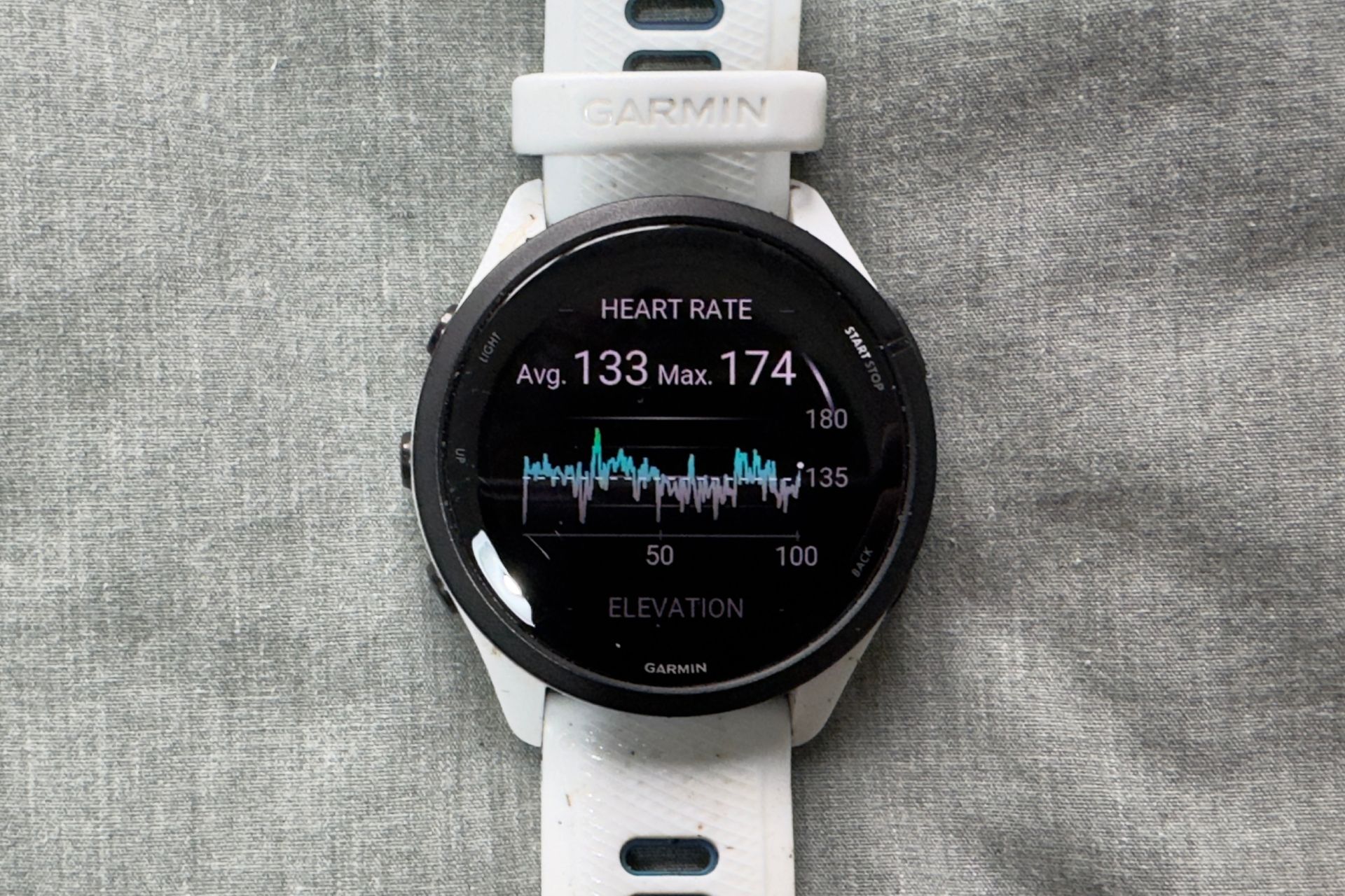 Male cyclist wearing the Garmin Forerunner 265