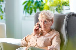 older woman talking on phone