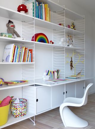 girls bedroom storage idea with String modular system, white modern chair