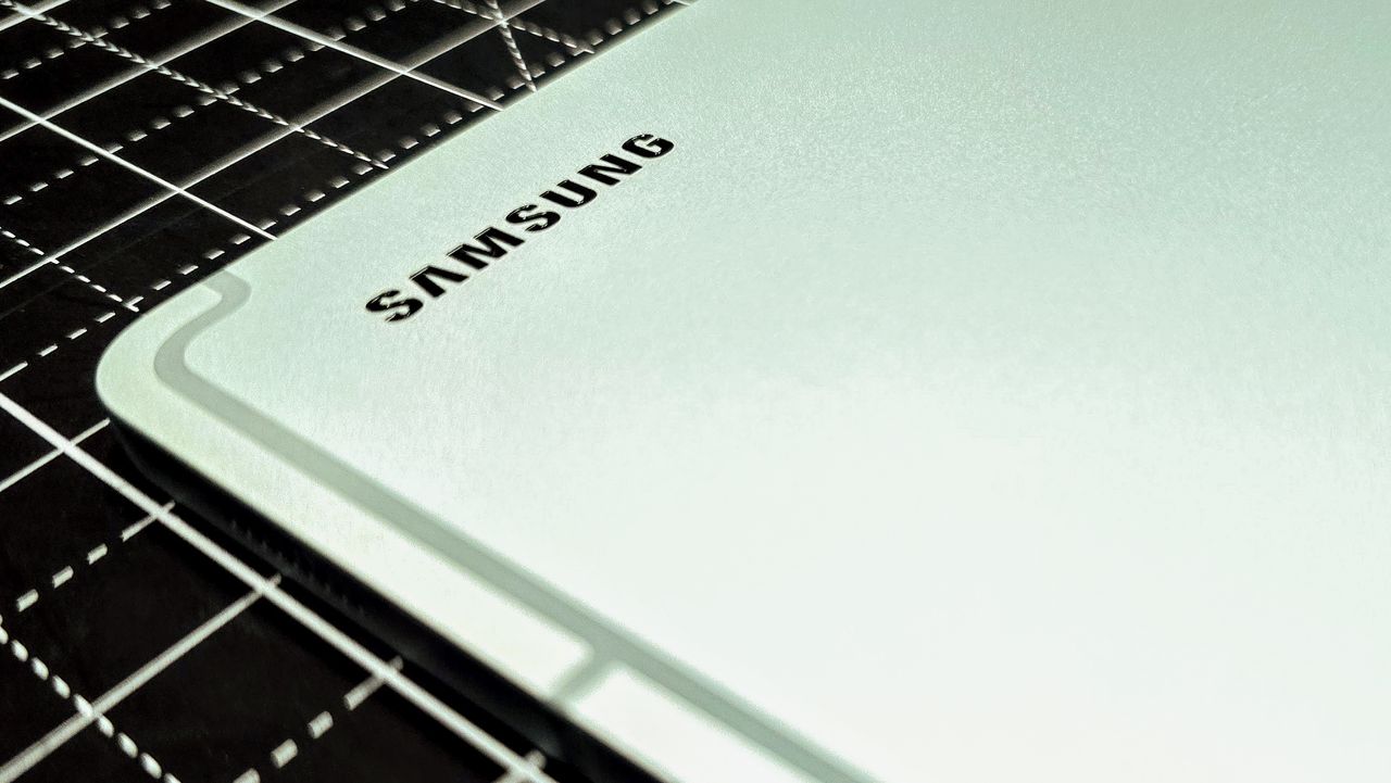 Samsung Galaxy Tab S9 FE Plus with screens and Book Cover in mint green