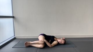 Kelly Turner demonstrates reclined twist on floor