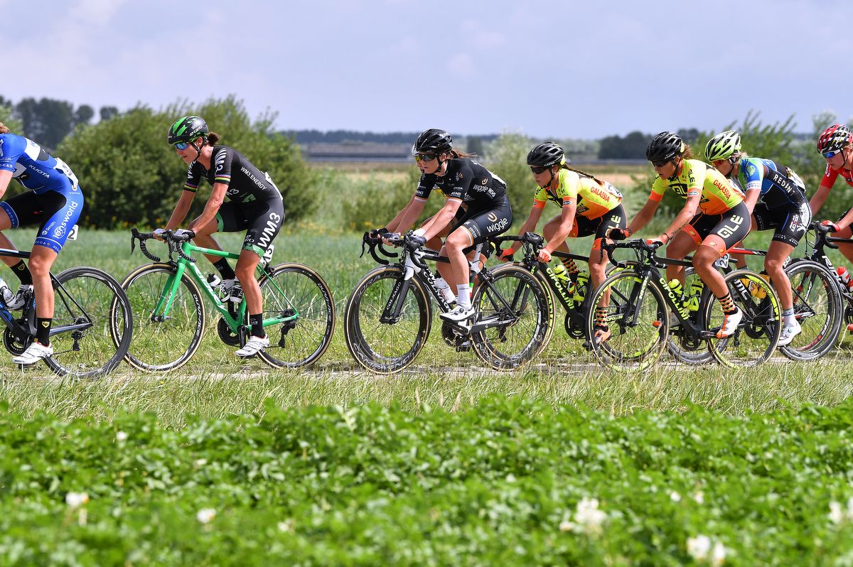 Marianne Vos (WM3 Pro Cycling) sitting in the peloton