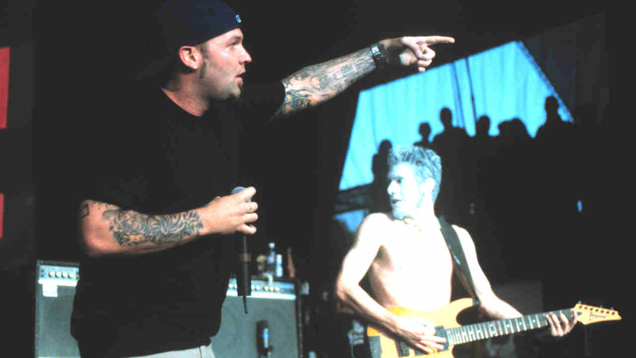 Limp Bizkit&amp;rsquo;s Fred Durst and Wes Borland performing onstage in 1999