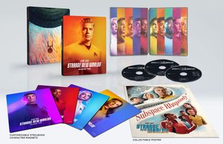 colorful star trek dvd covers are arrayed against a white background.