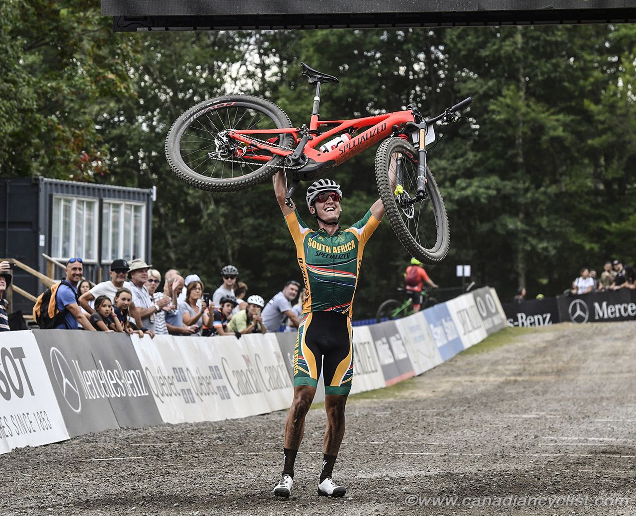 Alan Hatherly (South Africa) wins and lifts his bike to celebrate