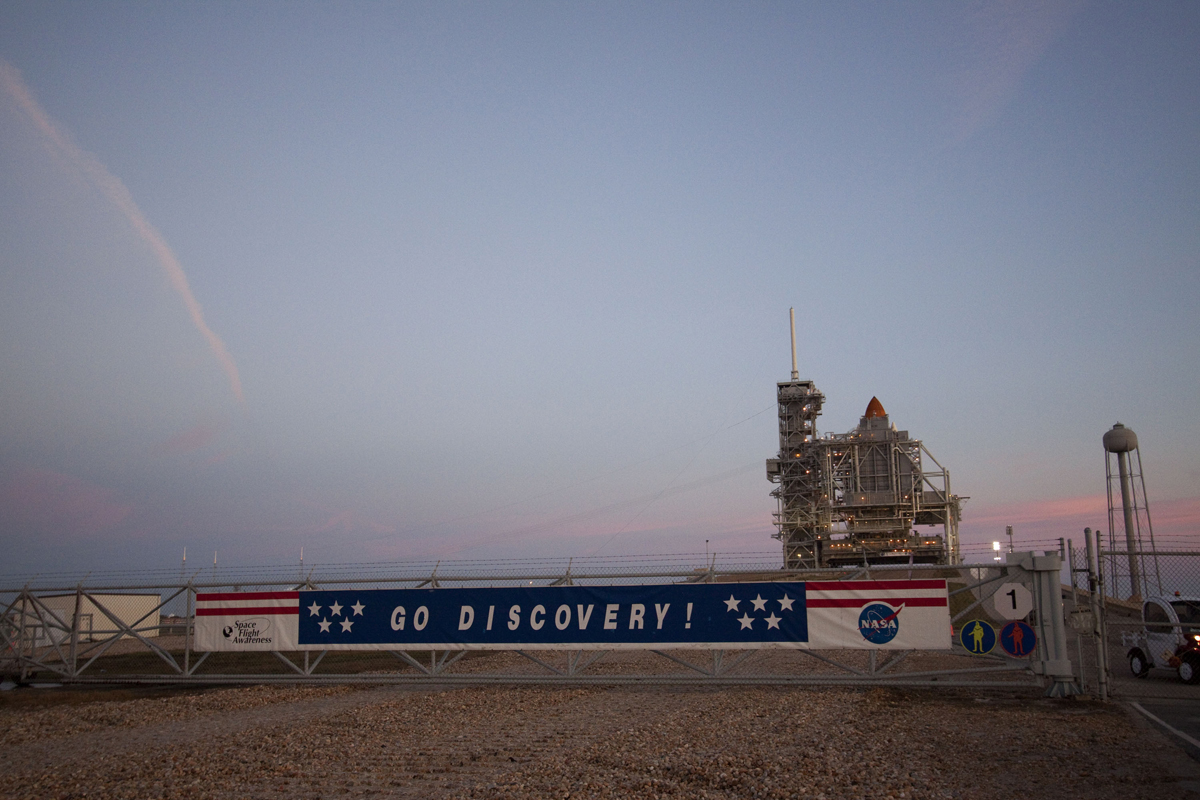 Photo of space shuttle Discovery at launch pad for final launch on the STS-133 mission