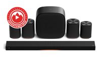 The full LG Sound Suite system (a soundbar, two pairs of wireless speakers and a wireless subwoofer) arranged against a white background. In the corner of the image is a red logo that says 'Adventures in AV'.