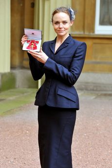 Stella McCartney collects her OBE from the Queen