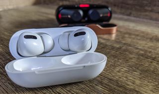 Apple AirPods Pro in charging case on tabletop