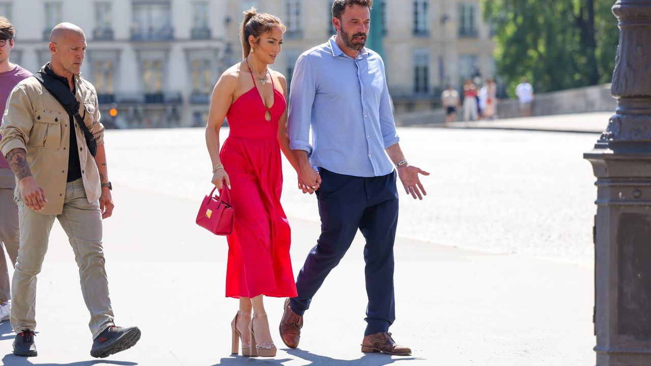 Jennifer Lopez and Ben Affleck are seen strolling near the Louvre Museum on July 24, 2022 in Paris, France.