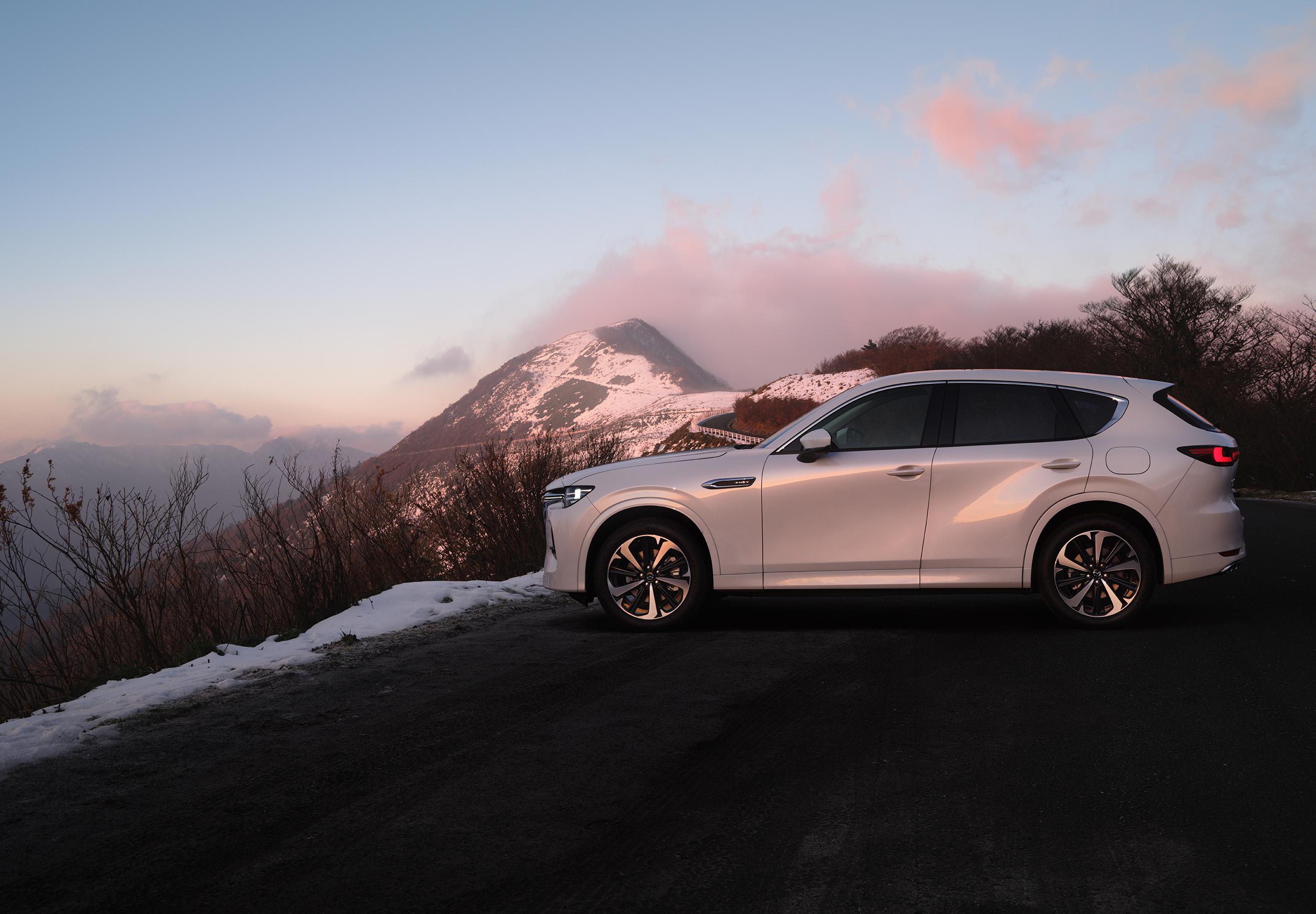Mazda CX-60 with mountain backdrop