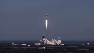 A SpaceX Falcon 9 rocket launches on a record 8th flight to delivery 60 Starlink internet satellites into orbit from Pad 39A of NASA's Kennedy Space Center on Jan. 20, 2021.