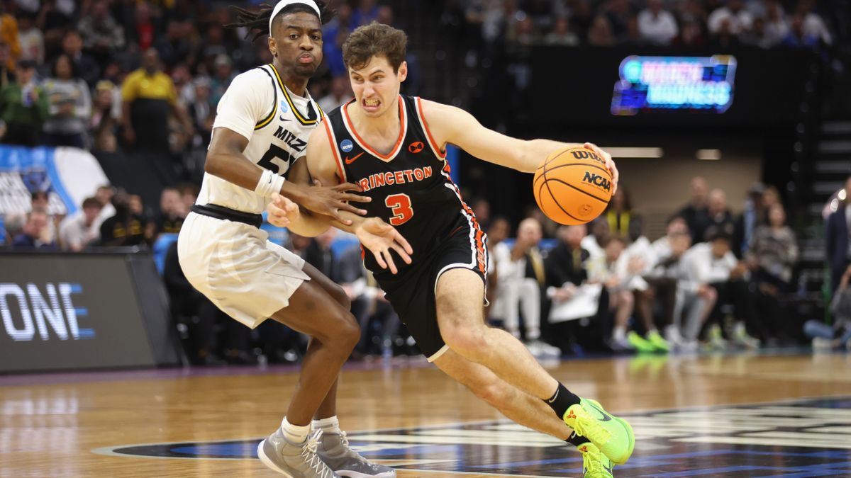 Ryan Langborg #3 of the Princeton Tigers drives to the basket during NCAA March Madness 2023