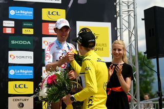 Ben O'Connor being congratulated on his Critérium du Dauphiné podium placing by winner Jonas Vingegaard