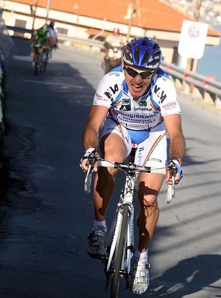 Bertolini is being chased by Pozzato et al.
