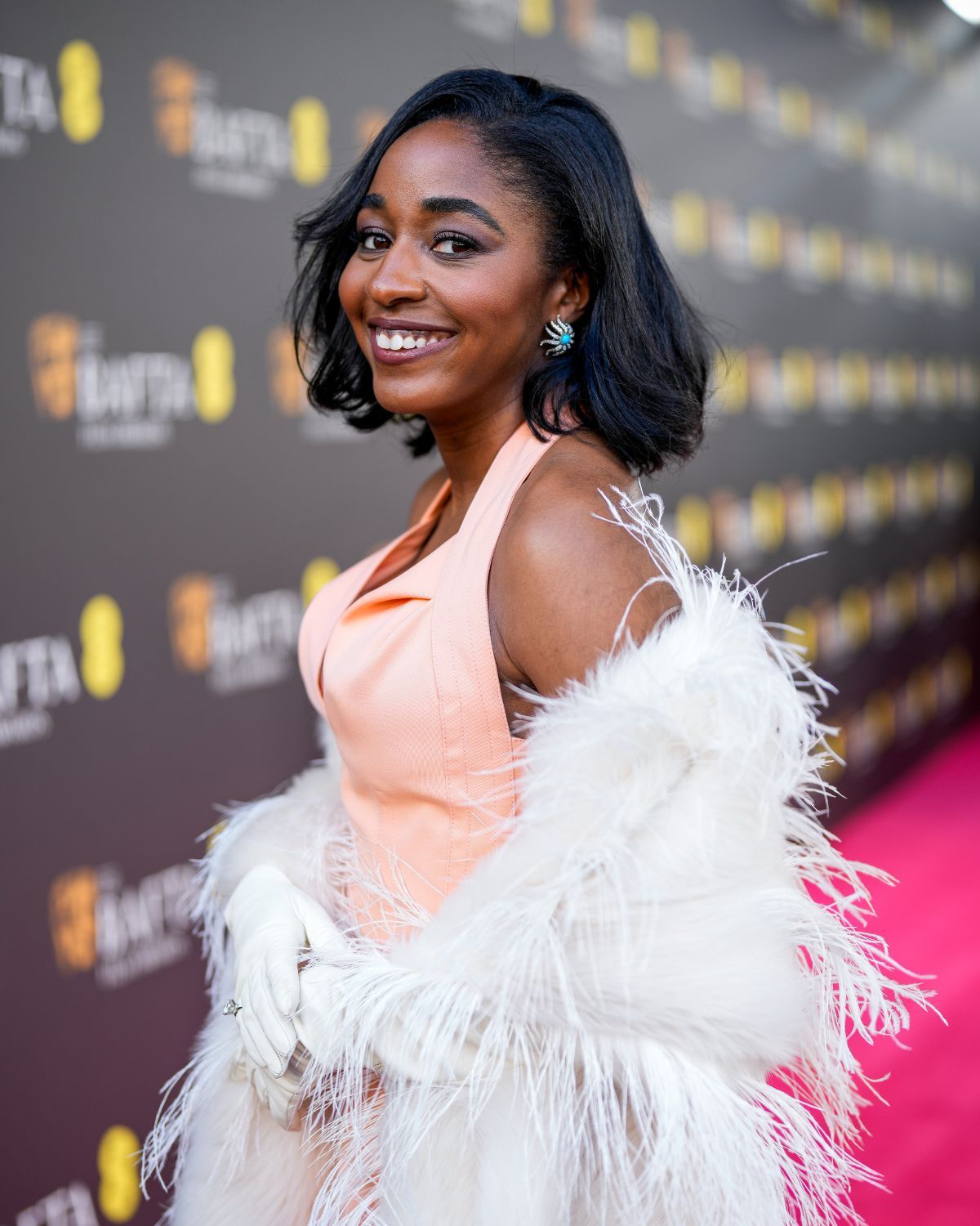 Beauty News: This Easy Trick Is the Key to Expensive-Looking Hair—I Saw It All Over the BAFTAs 5 Ayo Edebiri wearing a side parting at the BAFTAs 2024