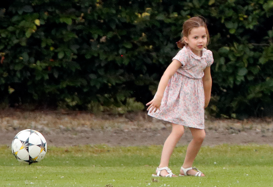 Princess Charlotte playing football