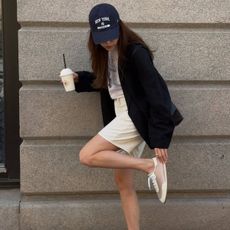 An image of @annabelrosendahl wearing one of the biggest trainer trends for summer 2026. 