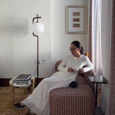 Woman sitting in her apartment