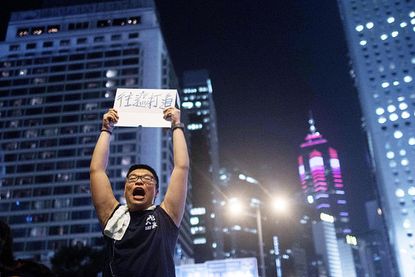 Hong Kong activists debate government officials on democracy