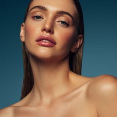 a model with very glossy skin