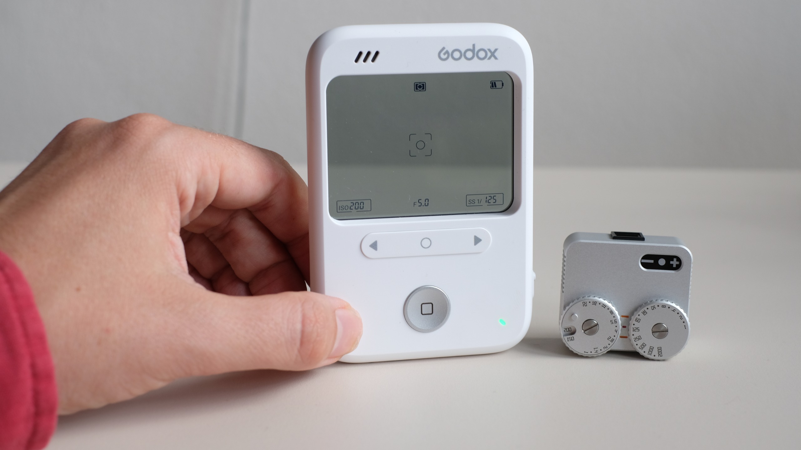 Photograph of the Godox C100 compact camera with transparent screen / viewfinder