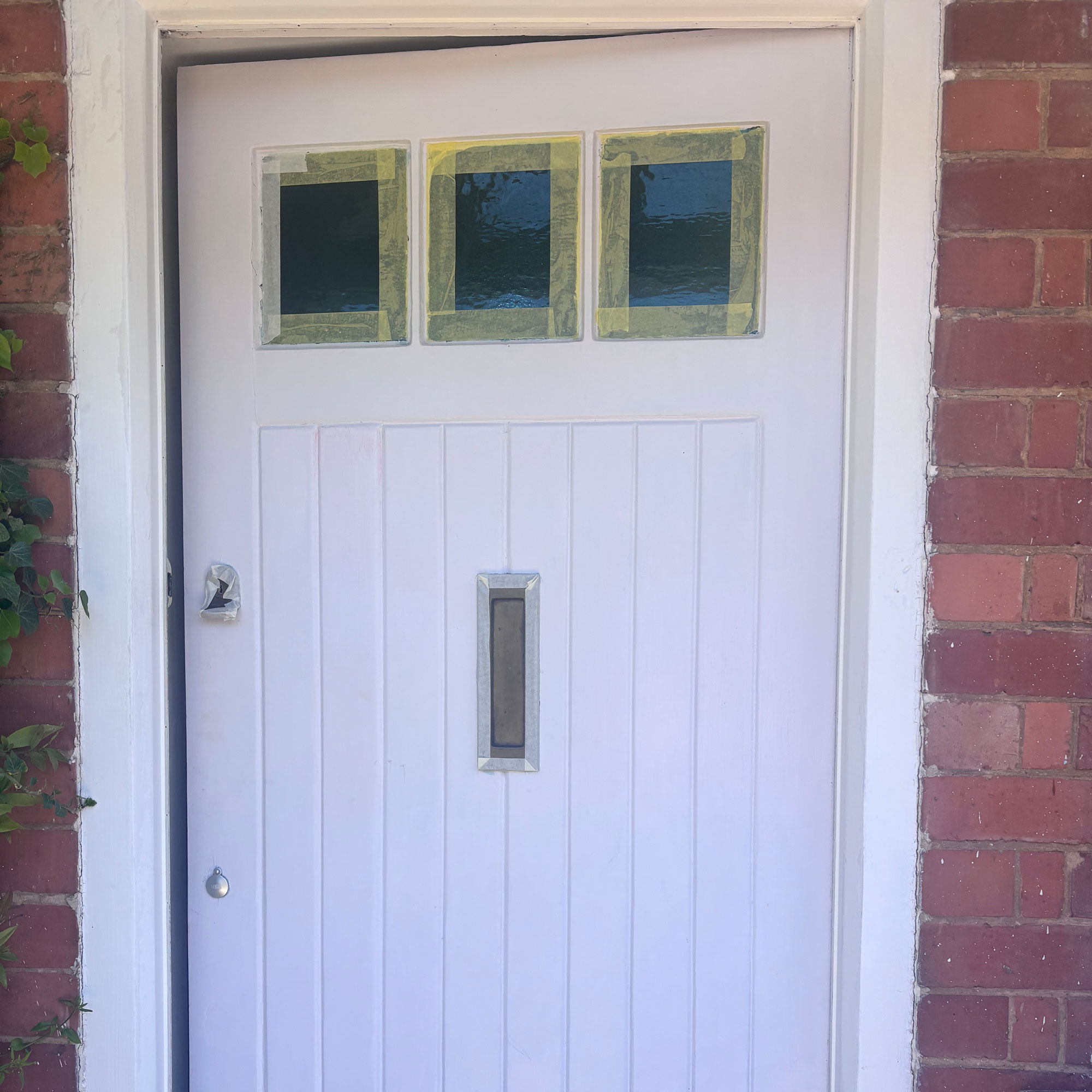 masking off for painting a front door