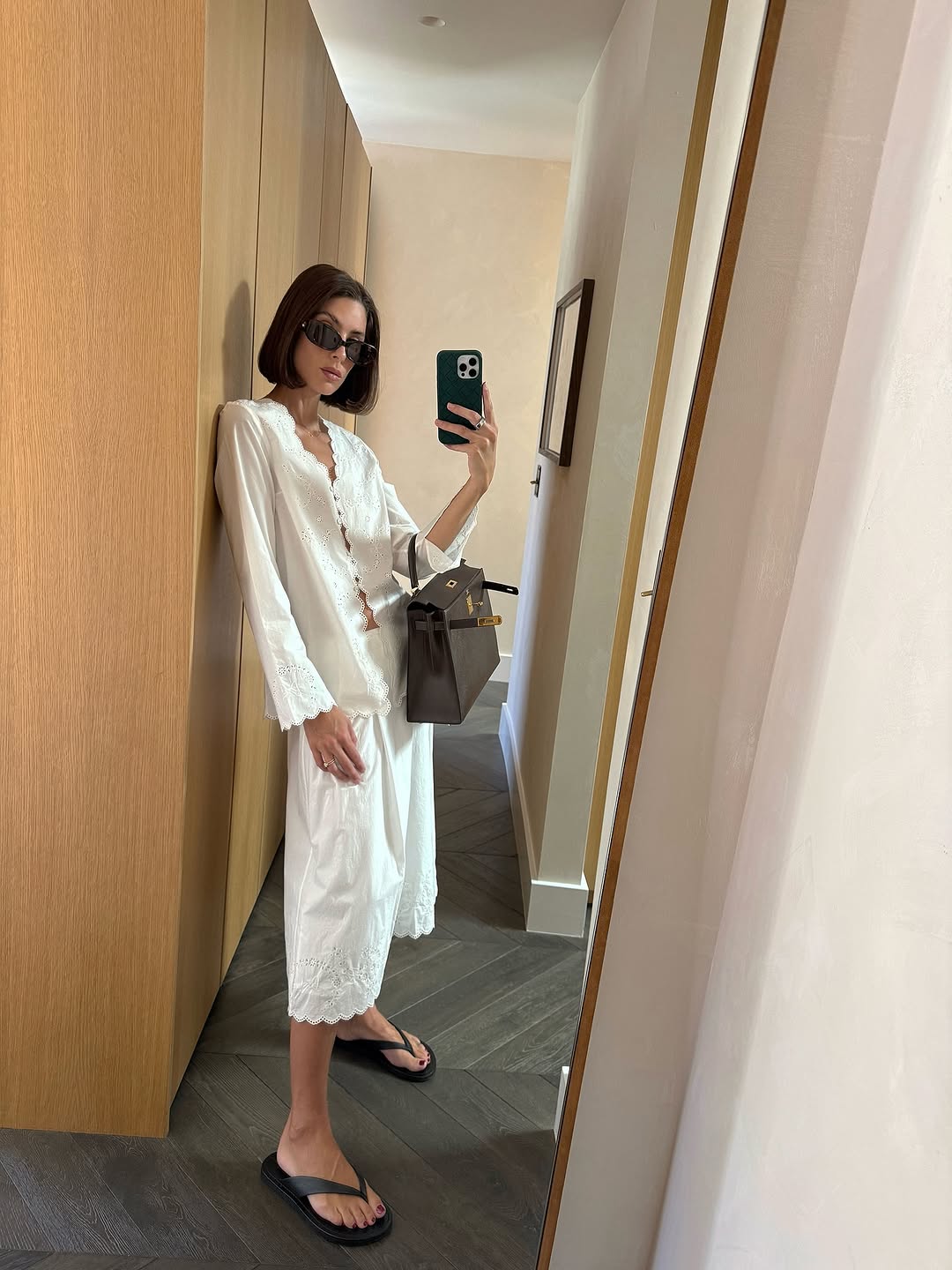 An image of a woman wearing timeless summer outfit