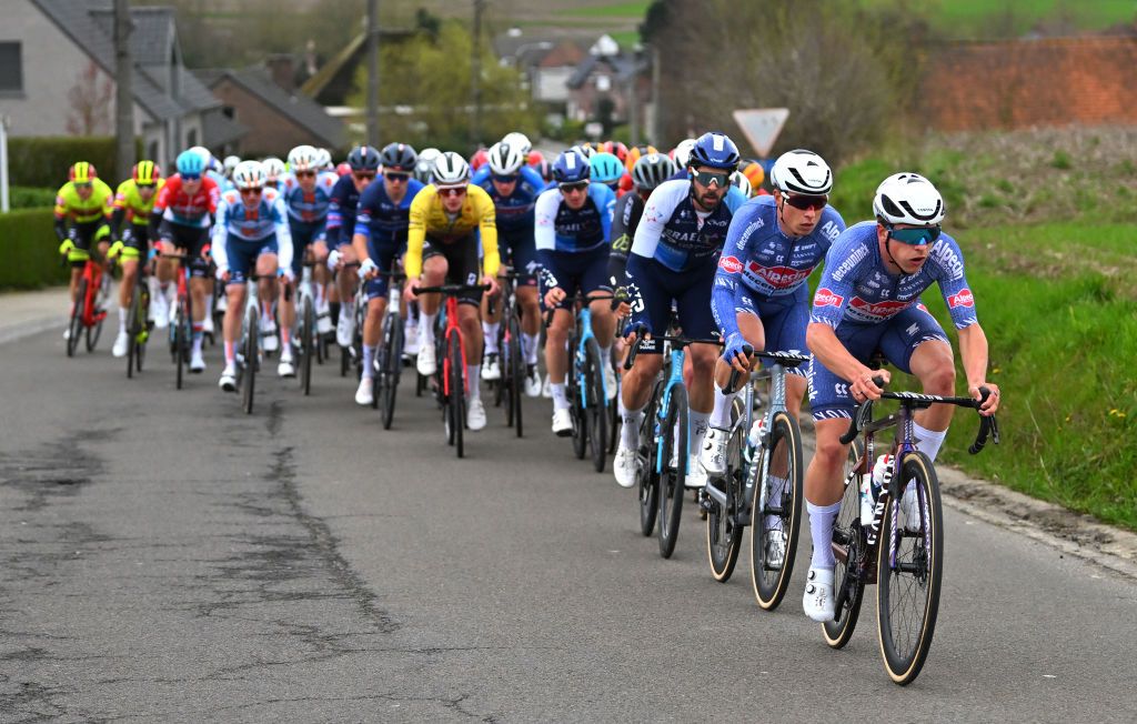 NOKERE BELGIUM MARCH 13 LR Jasper Philipsen of Belgium and and Lars Boven of The Netherlands and Team Alpecin Deceuninck lead the peloton during the 78th Danilith Nokere Koerse 2024 Mens Elite a 1881km one day race from Deinze to Nokere UCIWT on March 13 2024 in Nokere Belgium Photo by Luc ClaessenGetty Images