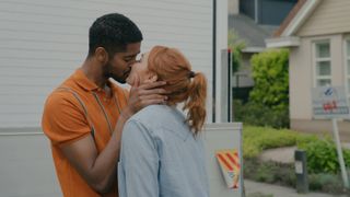 Pete and Evie kiss next to their moving van in The Couple Next Door episode 1