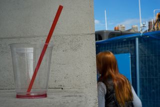Red straw on glass